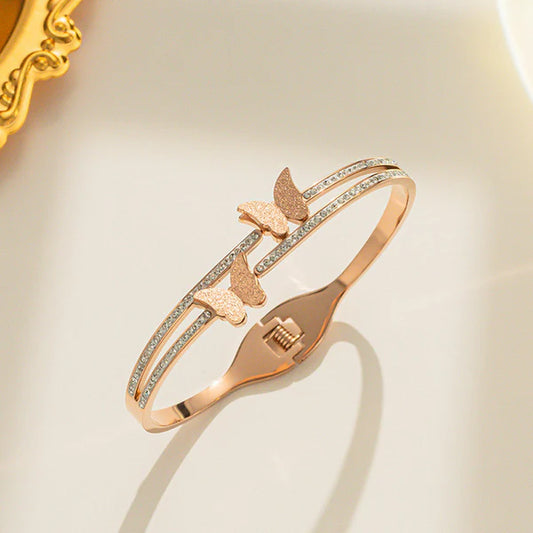 Stainless Steel Rose Gold Plated Butterfly inspired American Diamond Studded Bracelet For Women